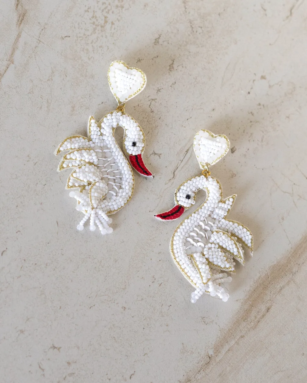 White Swan Beaded Earrings sold by Care Tucker