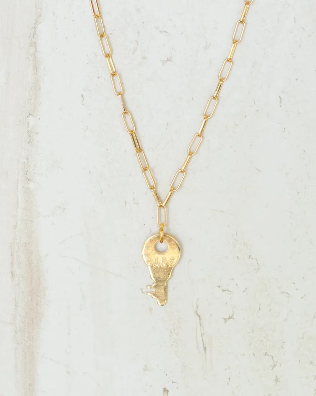 CARE Mini Giving Key Necklace made by The Giving Keys