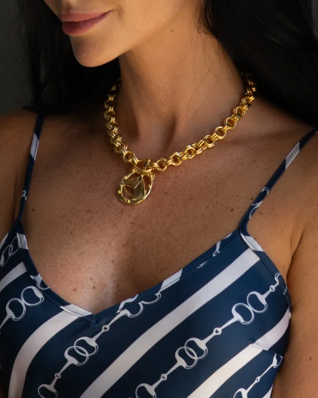 Gold Horseshoe Necklace sold by Care Tucker