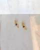 Blue Snake Earrings sold by Care Tucker