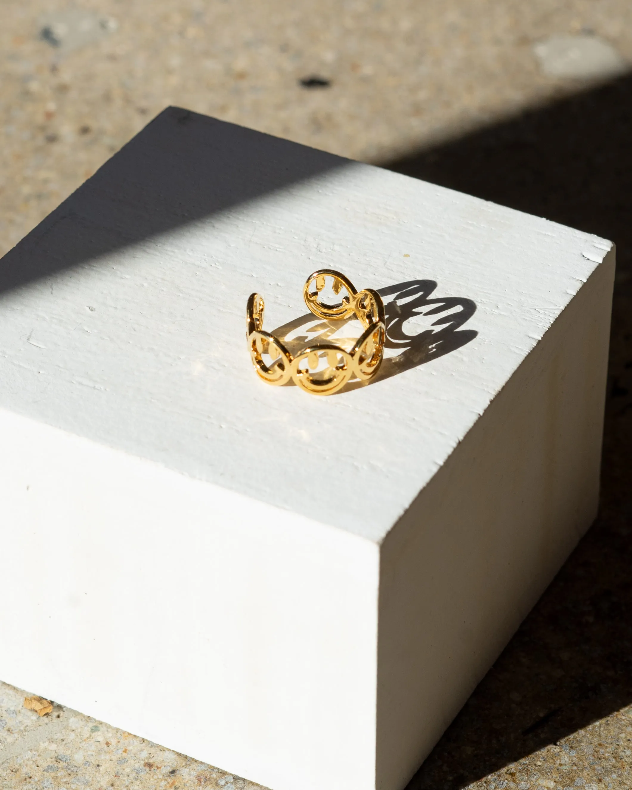 Smiley Face Adjustable Ring sold by Care Tucker