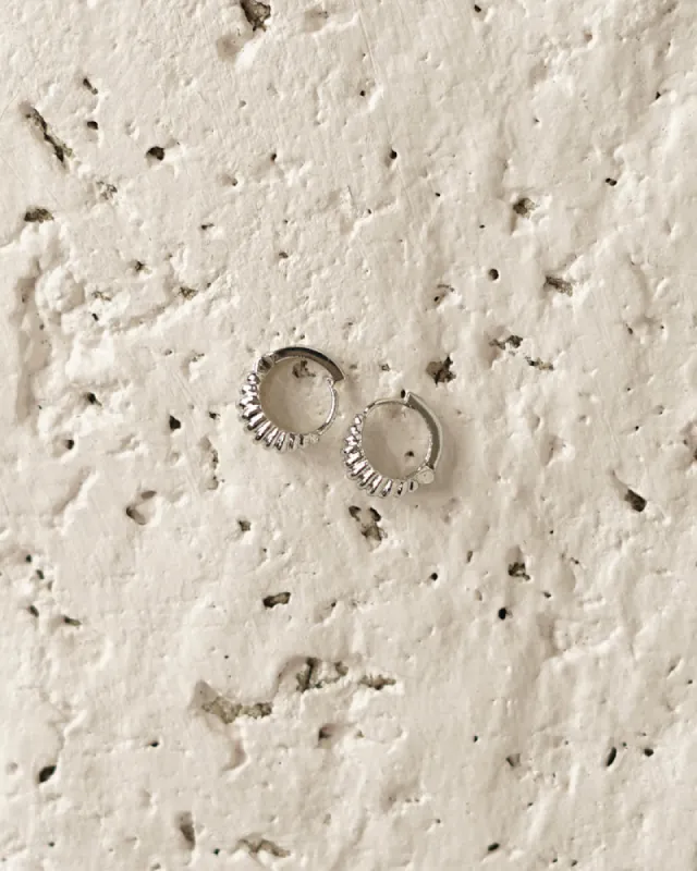 Huggie Hoops Half Textured sold by Care Tucker