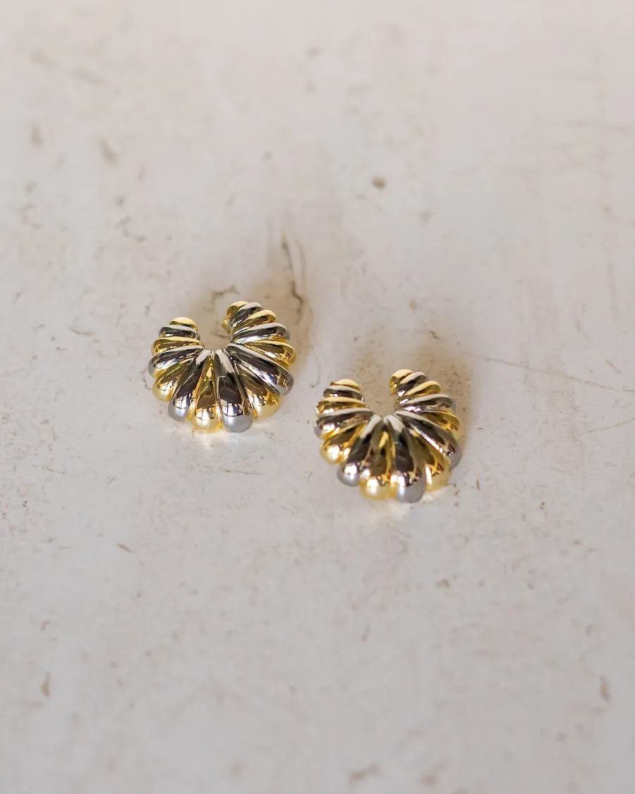 Mixed Metal Croissant Earrings sold by Care Tucker