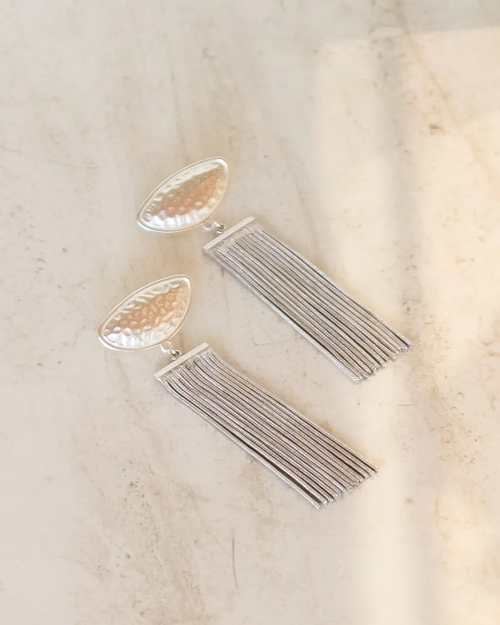 Hammered Metal Half Disc Gold Tassel Earrings sold by Care Tucker
