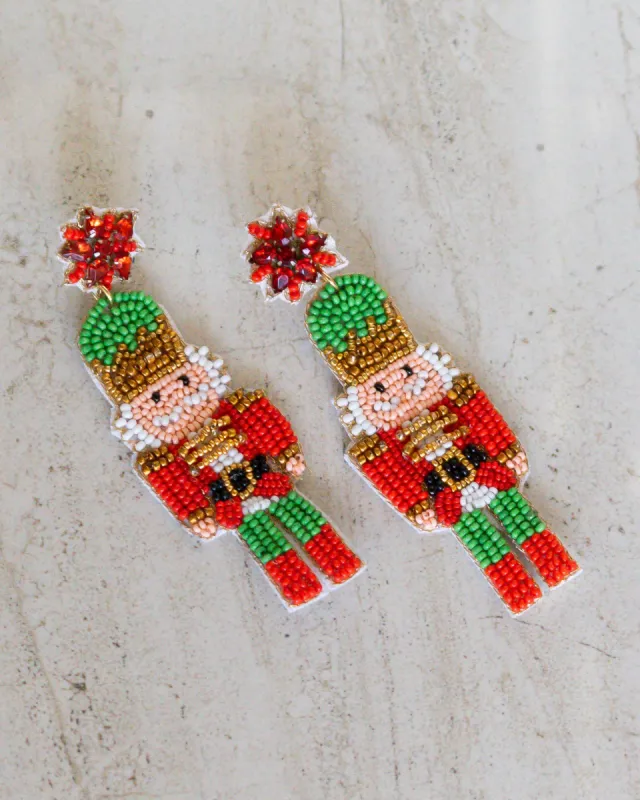 Christmas Dangly Nutcracker Earrings sold by Care Tucker