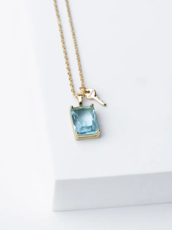 Emerald Cut Gemstone and Mini Key Necklace in Gold sold by Care Tucker