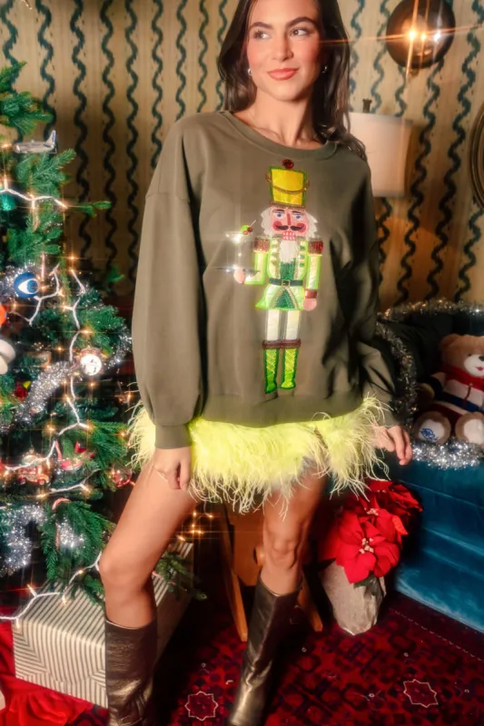 Olive Green Martini Server Nutcracker Sweatshirt sold by Care Tucker