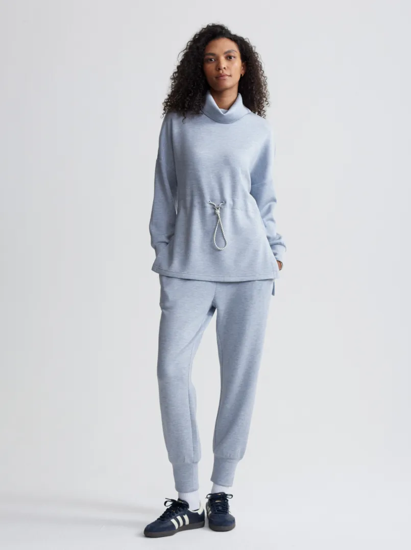 The Slim Cuff Pant 27.5" mid blue marl sold by Care Tucker