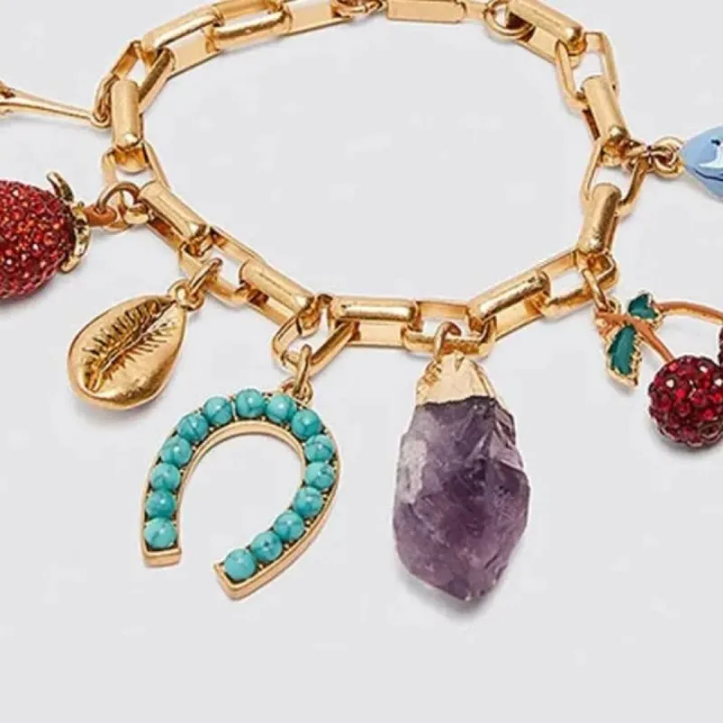 Charm Bracelet- Horse Shoe, Cherrys & Flowers sold by Care Tucker