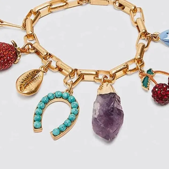 Charm Bracelet- Horse Shoe, Cherrys & Flowers sold by Care Tucker