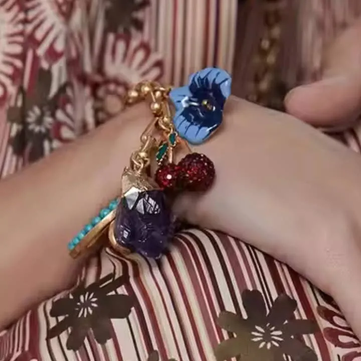 Charm Bracelet- Horse Shoe, Cherrys & Flowers sold by Care Tucker product image thumbnail 2