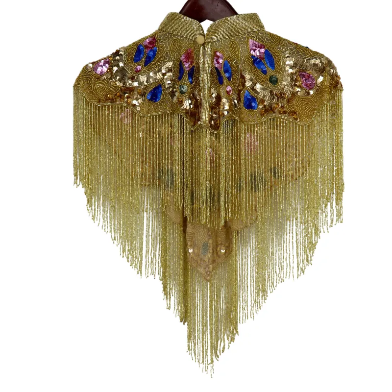 BEADED CAPE W/COLLAR  MULTI W/GOLD FRINGES sold by Care Tucker