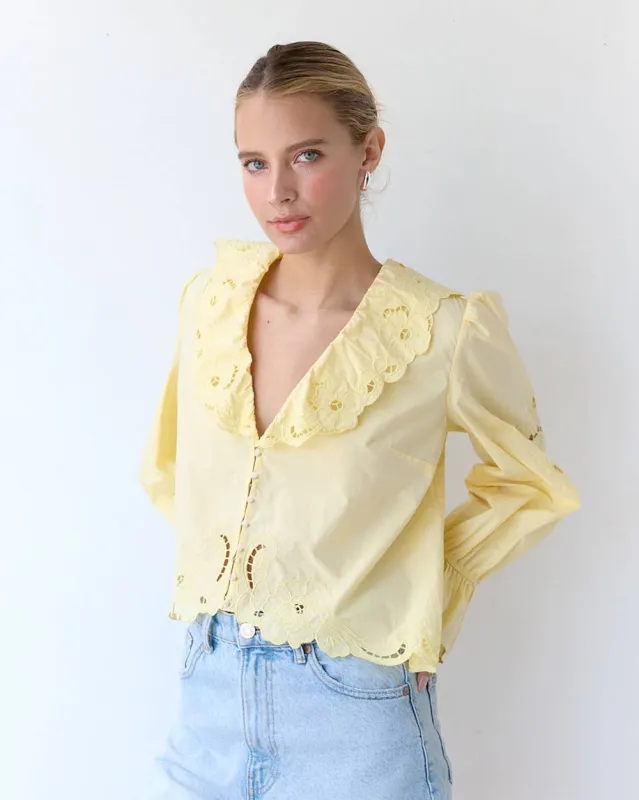 Emma Eyelet Ruffle Blouse sold by Care Tucker