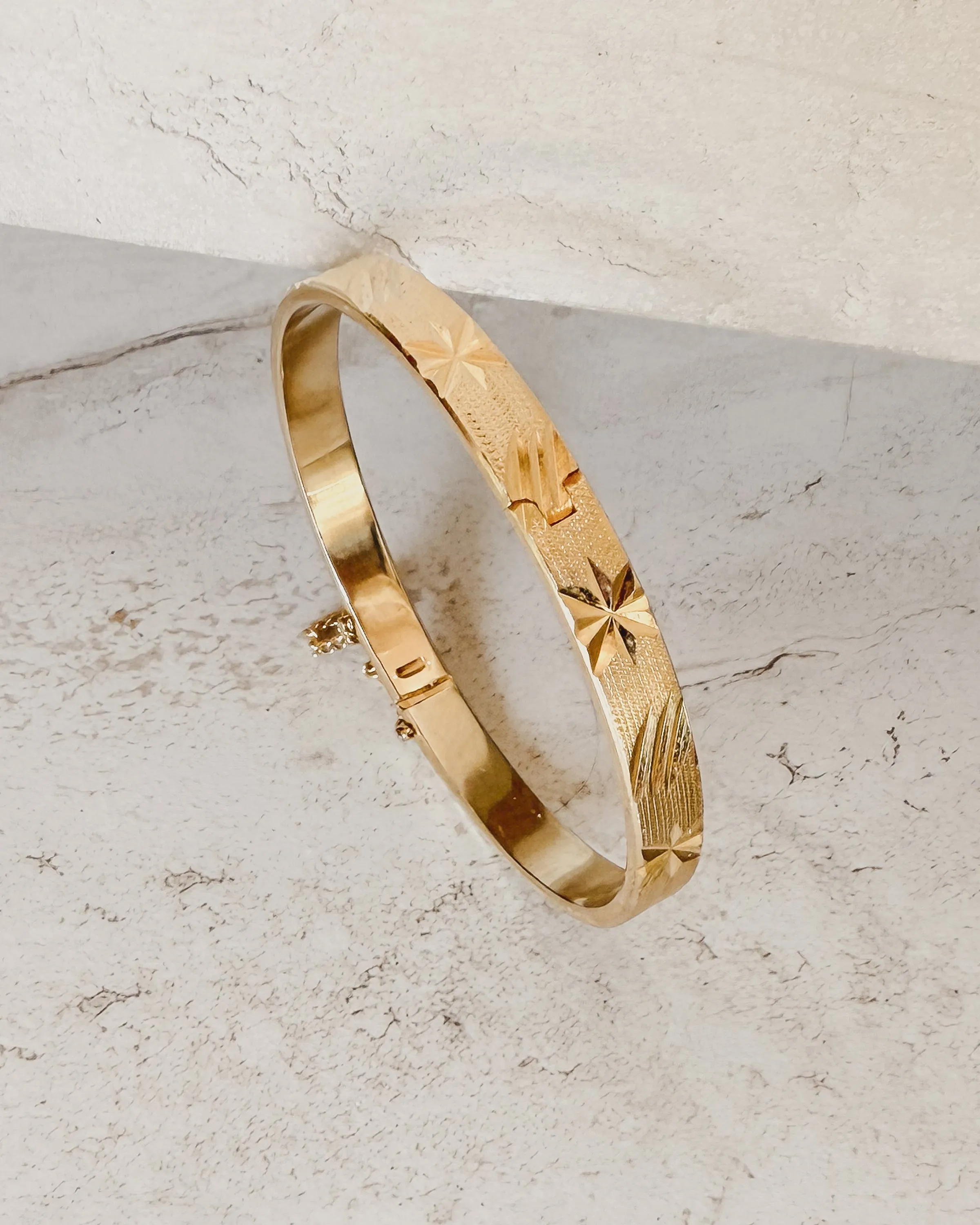 Vintage Etched Star Hinged Bangle Bracelet sold by Care Tucker