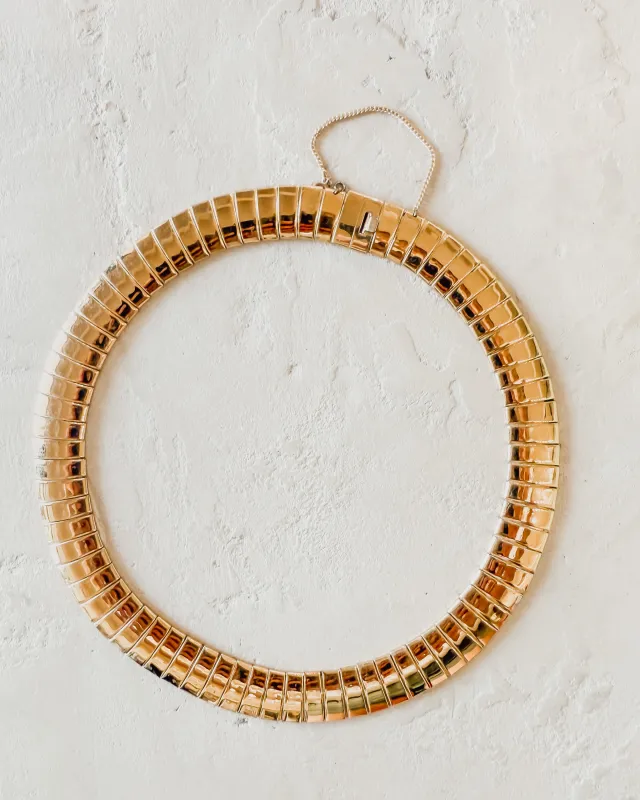 VINTAGE 80'S POLISHED OMEGA NECKLACE sold by Care Tucker