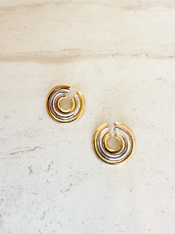 Vintage two tone earrings sold by Care Tucker