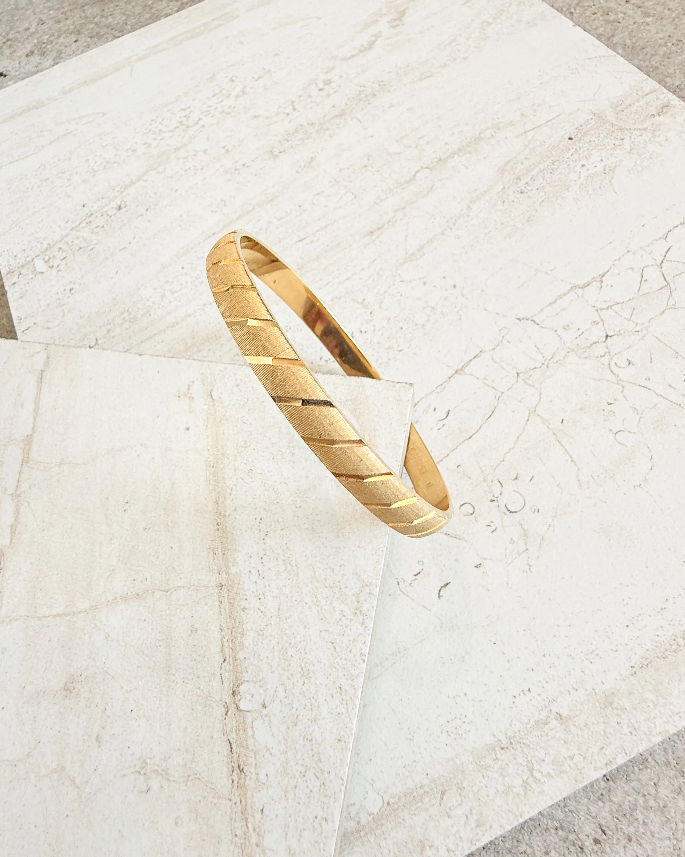 Vintage MONET Signed Gold Metal Bangle Bracelet sold by Care Tucker product image thumbnail 2