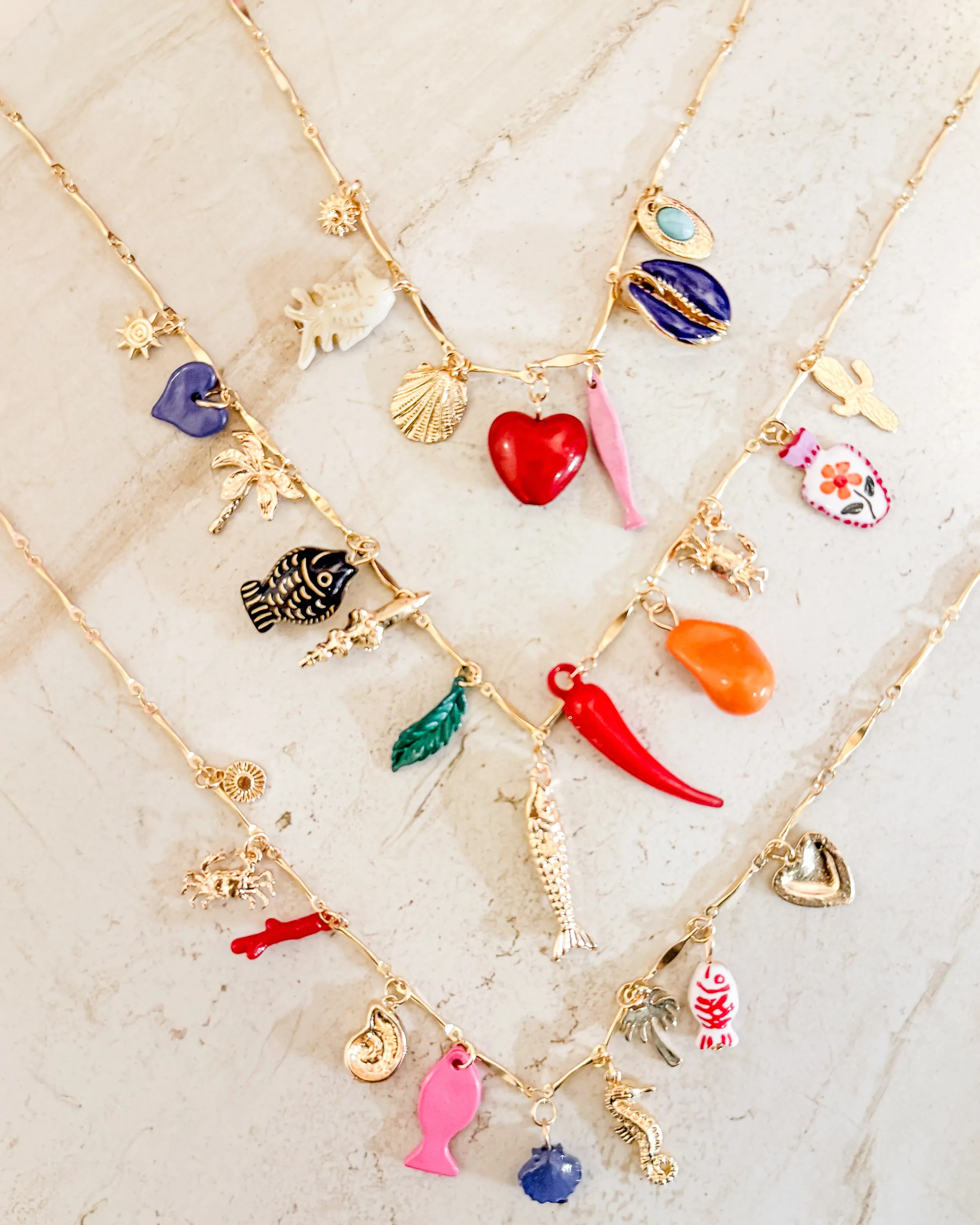 Multi Fish Pendant Necklace sold by Care Tucker