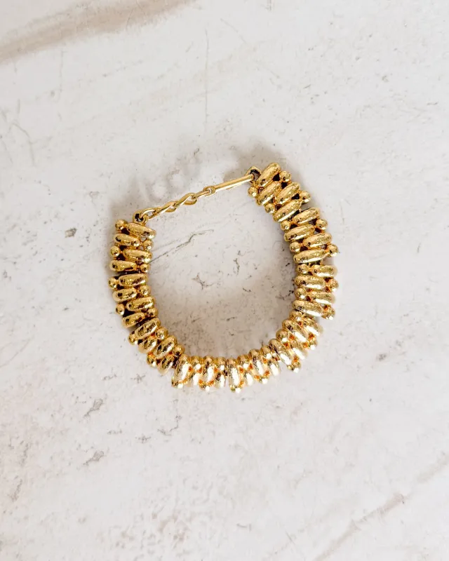 Vintage Gold Tone Hammered Links Bracelet sold by Care Tucker