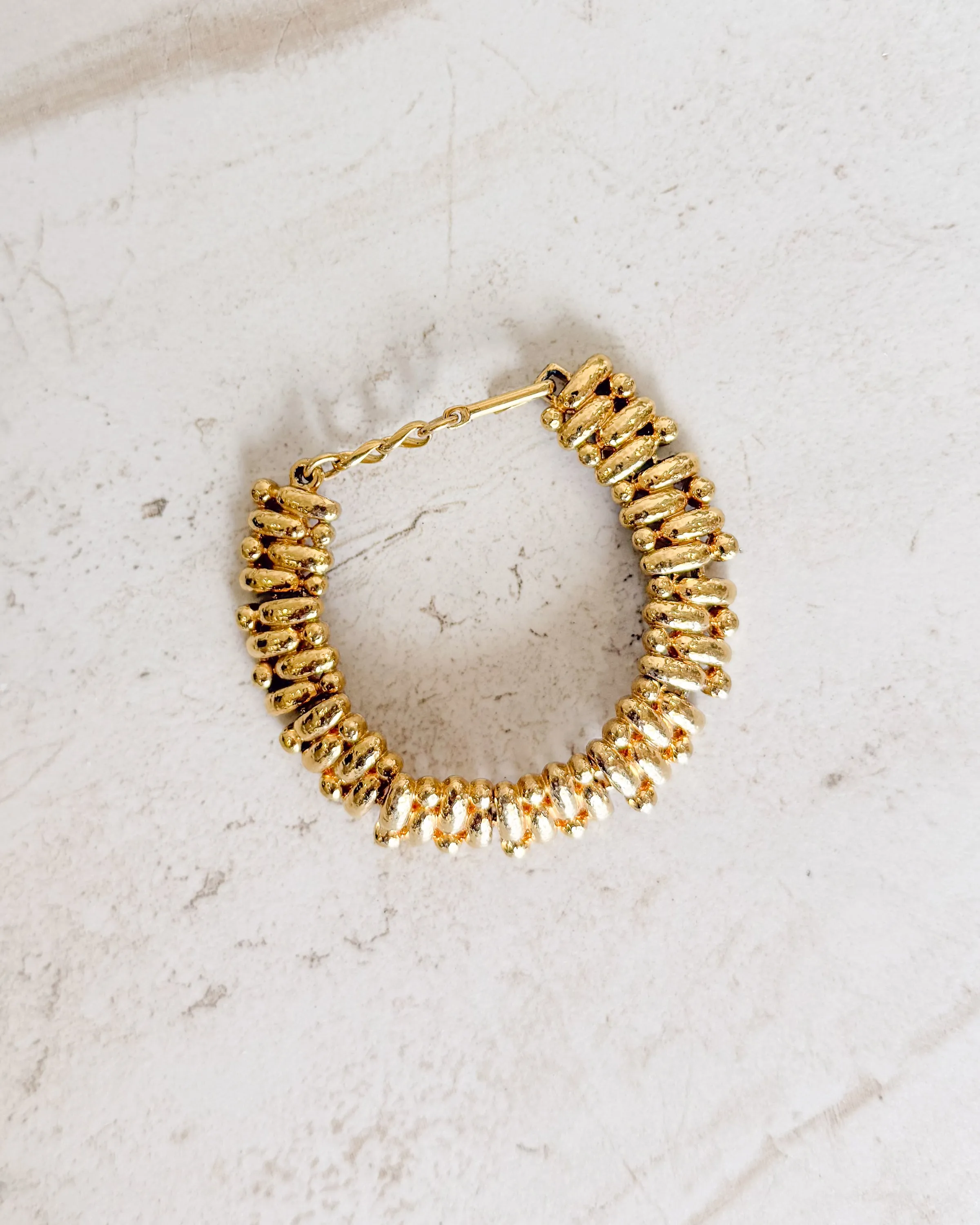 Vintage Gold Tone Hammered Links Bracelet sold by Care Tucker