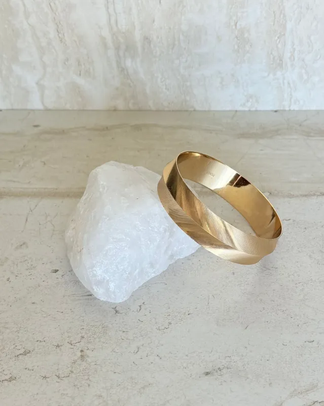 Vintage Gold Tone Etched Bangle Bracelet sold by Care Tucker