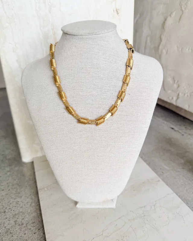 Vintage SIgned Gold Tone Coil Link Necklace sold by Care Tucker