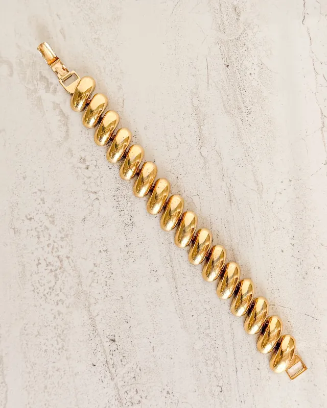 Vintage Signed Gold Gold Curved Link Bracelet sold by Care Tucker