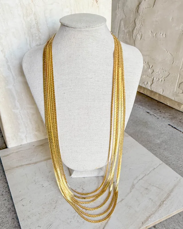 Vintage Signed 8 Layered Gold Toned Chain Necklace sold by Care Tucker