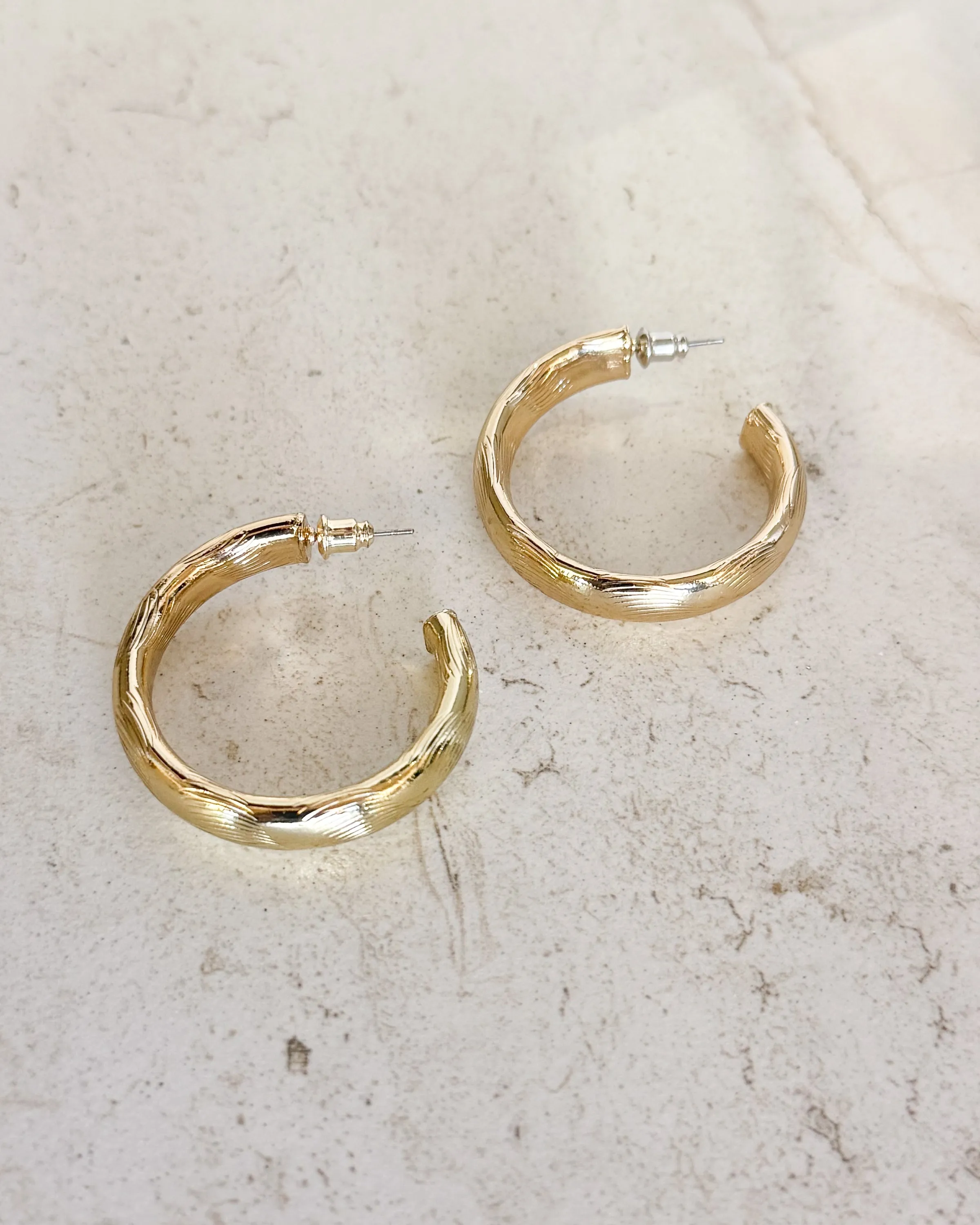 Lightly Textured Gold Hoop Earrings sold by Care Tucker product image thumbnail 2