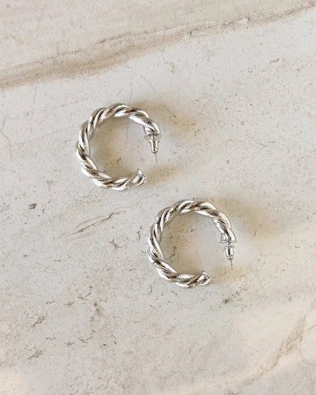Twisted Hoops sold by Care Tucker