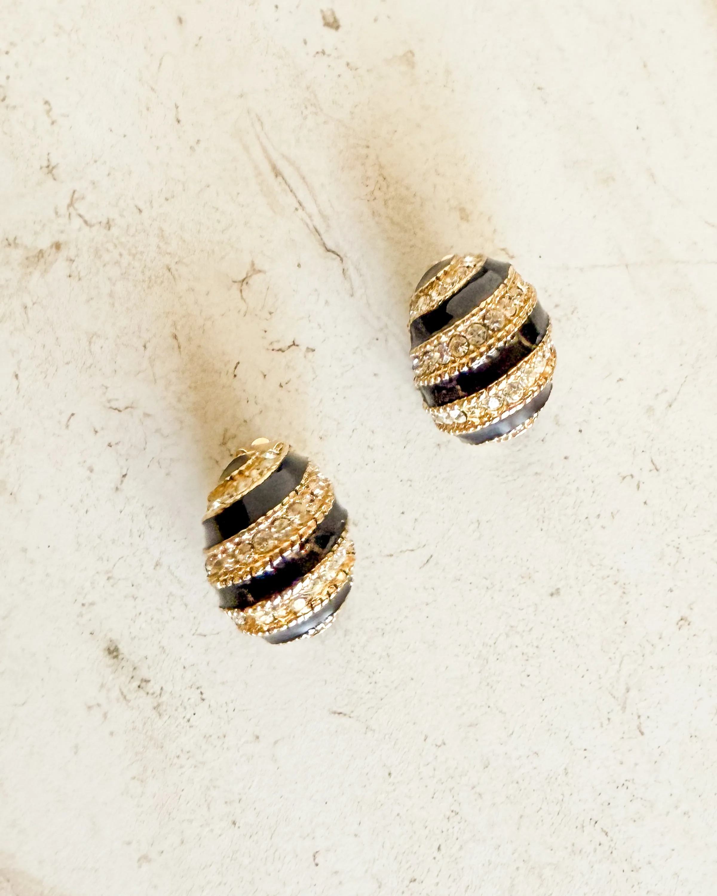 Vintage Designer gold enamel crystal clip on earrings sold by Care Tucker