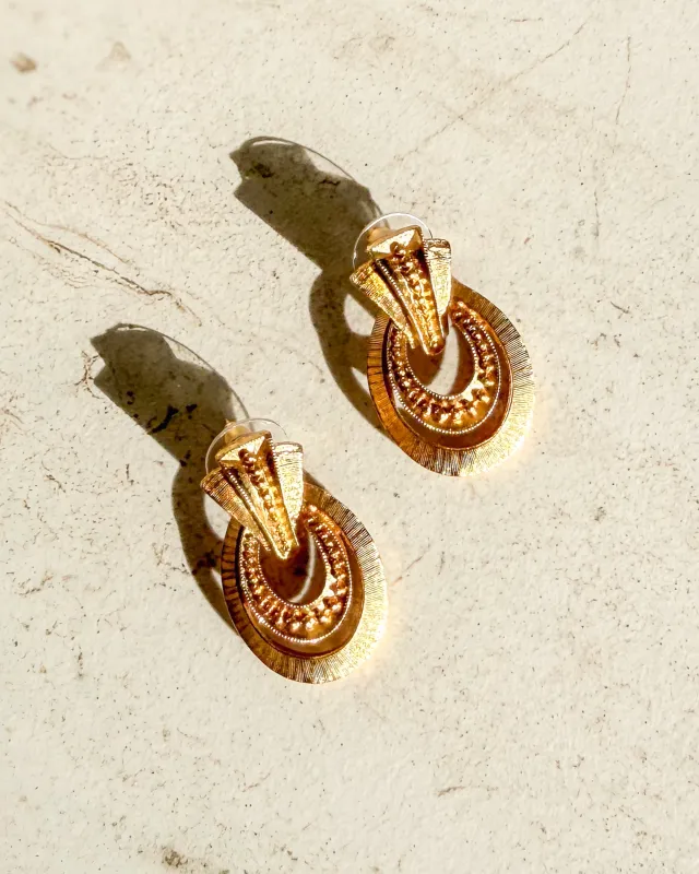 Vintage Signed Gold Tone Oval Knocker Clip On Earrings sold by Care Tucker