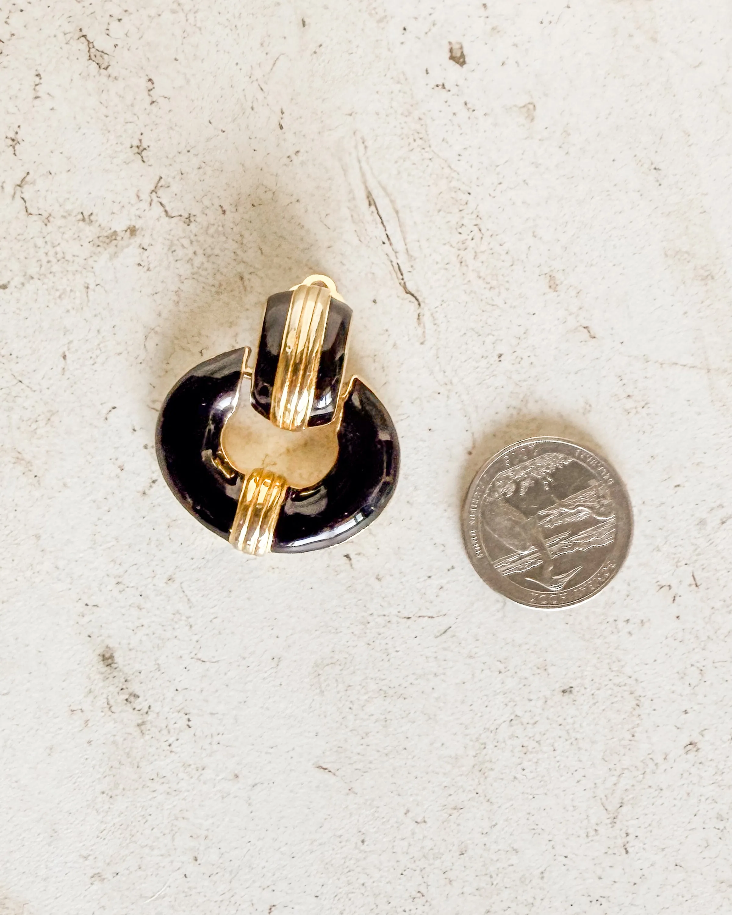 Vintage black and gold tone clip on earrings sold by Care Tucker product image thumbnail 2