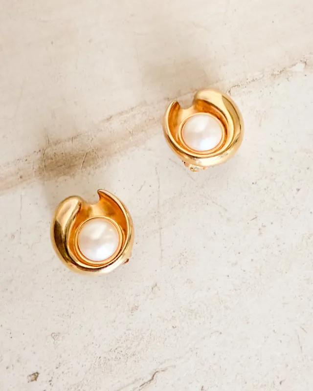 Vintage Signed Polished Gold Tone Swirl Clip On Earrings with Dome Pearl Center sold by Care Tucker