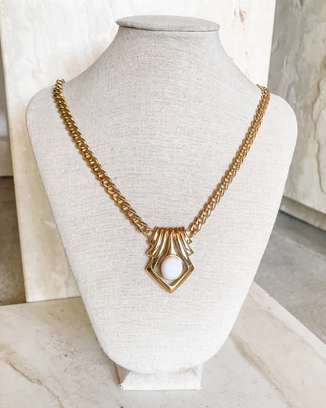 Vintage Signed  Vintage Gold Tone White Cabochon Pendant Necklace sold by Care Tucker