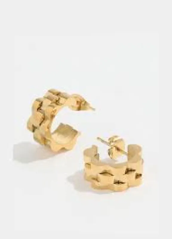 Watch link earrings sold by Care Tucker