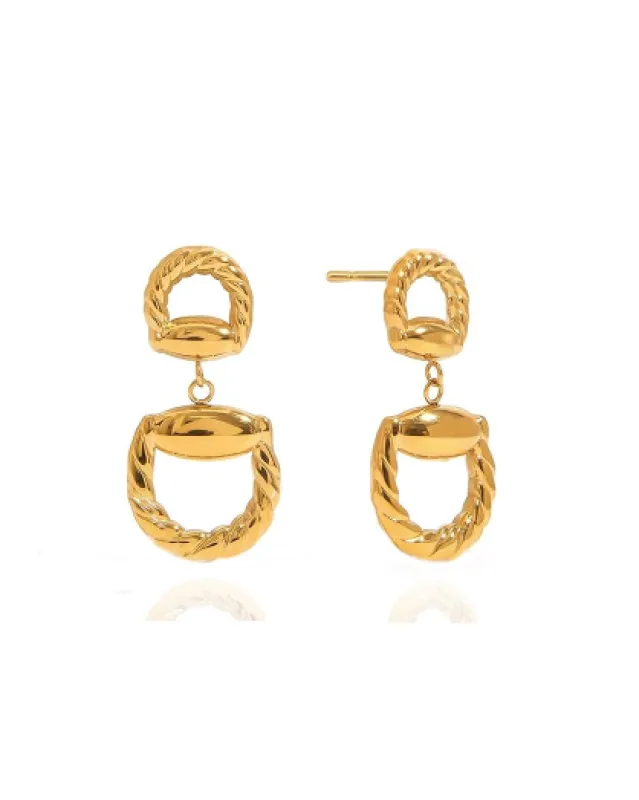 Horseshoe dangle earrings sold by Care Tucker