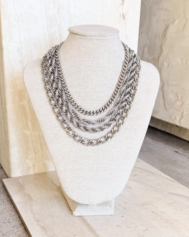 VIntage Designer Signed 4 Strand Silver Tone Necklace sold by Care Tucker