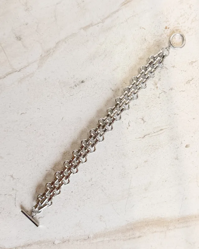 Thick Gold Interlocking Chain Bracelet sold by Care Tucker