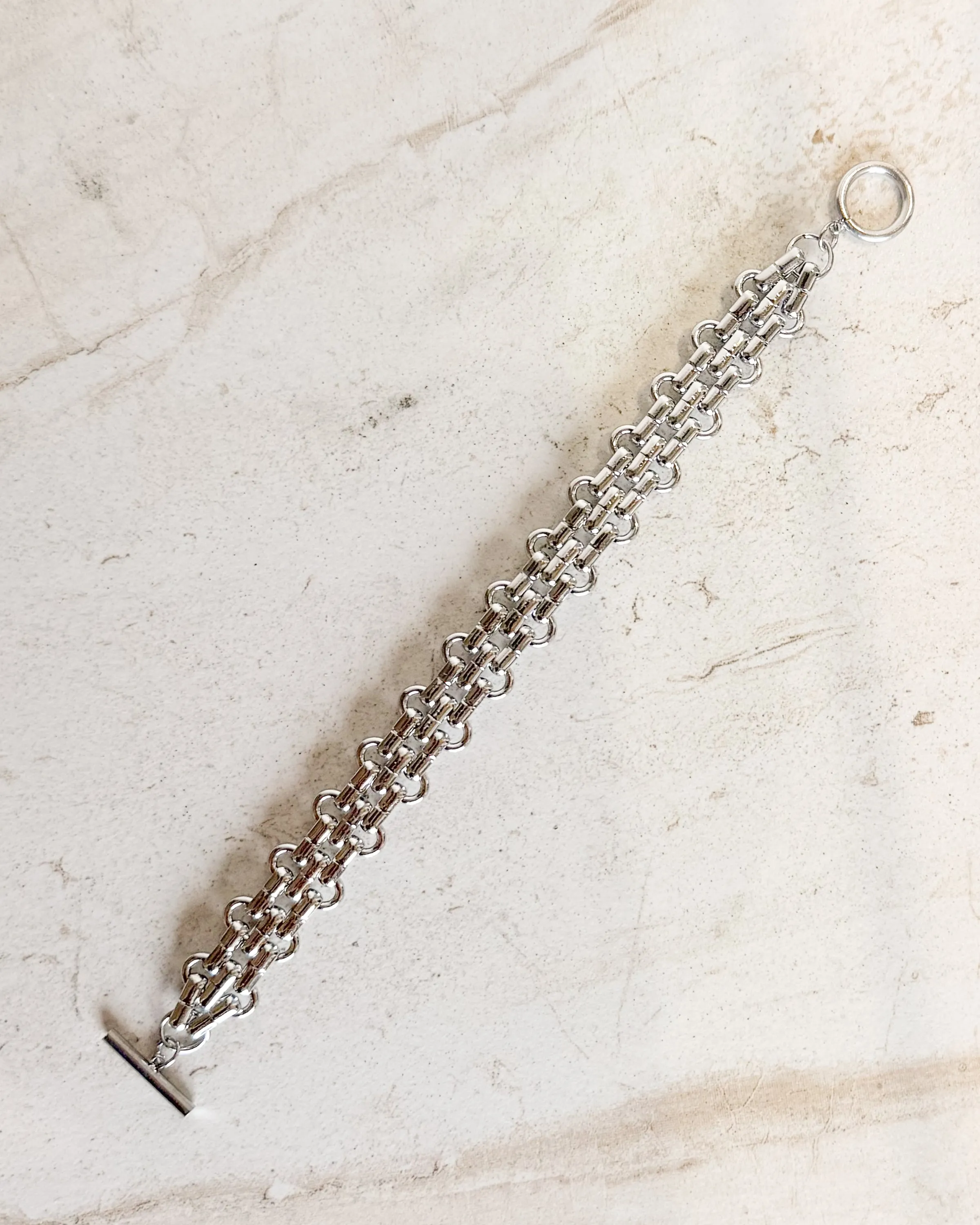 Thick Gold Interlocking Chain Bracelet sold by Care Tucker