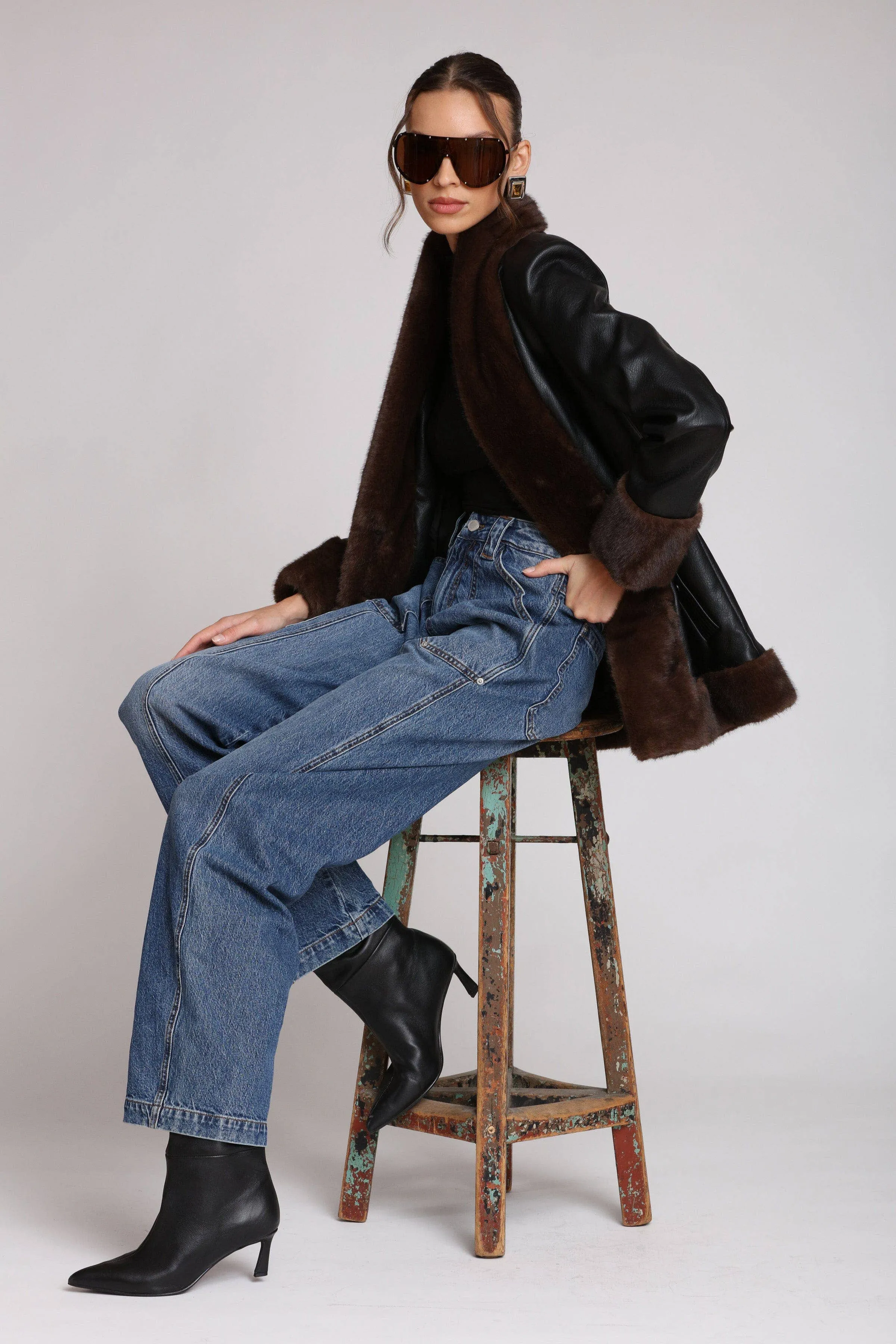 Faux Fur Trimmed Faux Leather Jacket sold by Care Tucker
