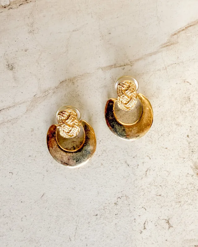 Vintage gold plated door-knocker earrings sold by Care Tucker