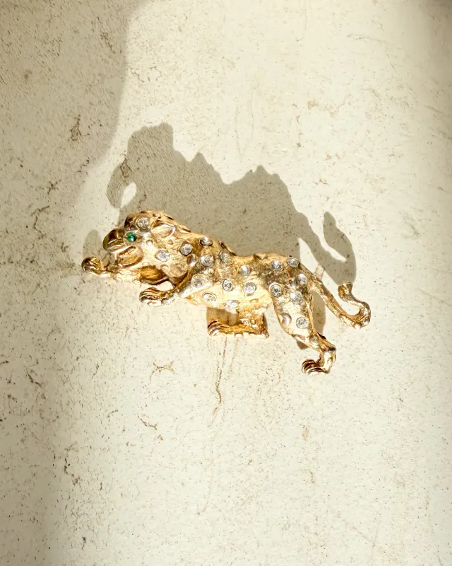 Vintage Signed rhinestone leopard brooch sold by Care Tucker