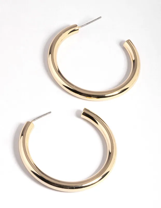 Gold Hoop Earrings sold by Care Tucker