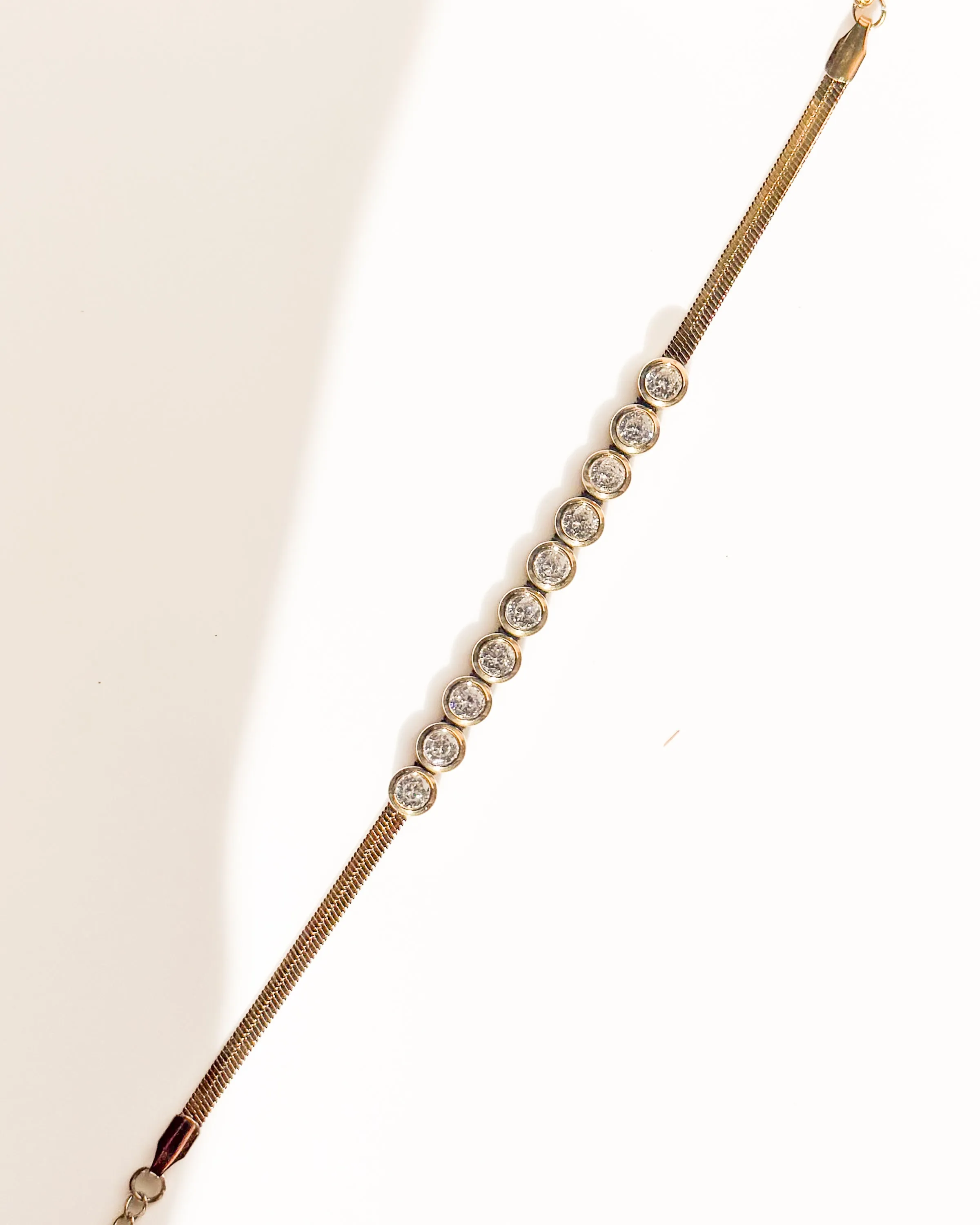 Gold Bracelet with Clear Rhinestone Rounds sold by Care Tucker