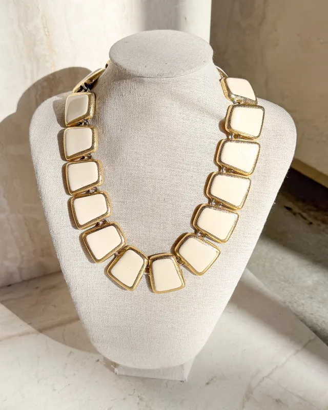 Vintage Designer gold tone and Ivory enamel wedge Necklace made by Care Tucker