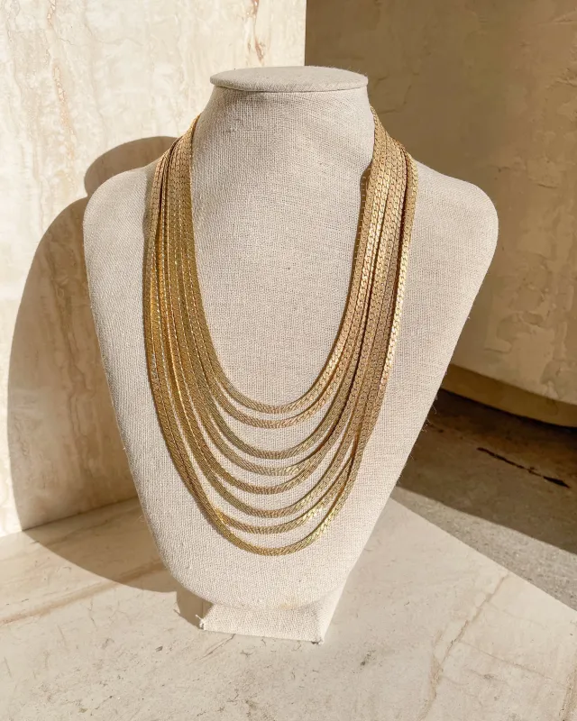 Vintage Signed 7 Strand Gold Chain Necklace sold by Care Tucker