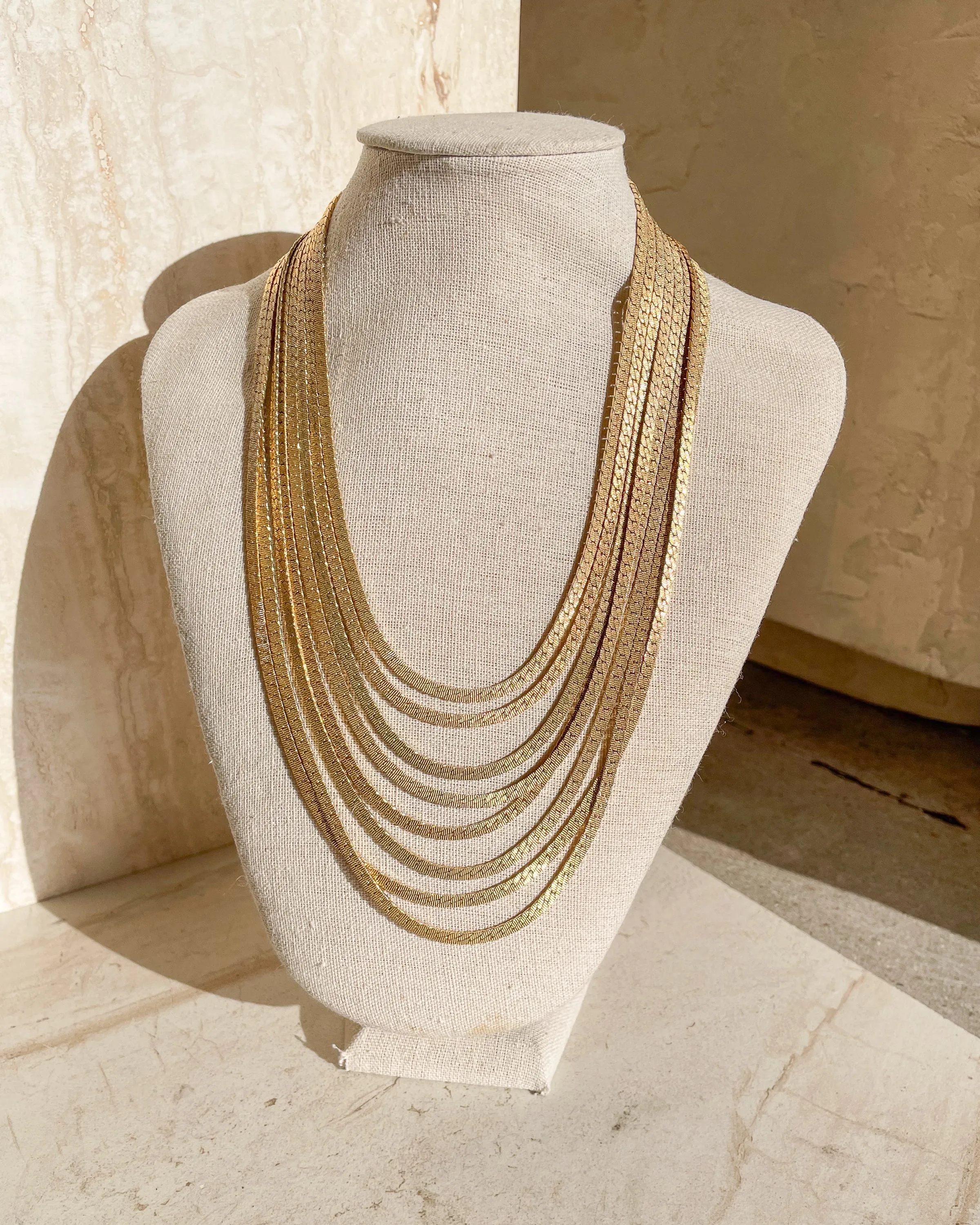 Vintage Signed 7 Strand Gold Chain Necklace sold by Care Tucker