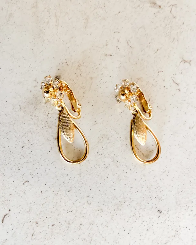 Vintage Signed Flower Rhinestone Teardrop Clip-on Earrings sold by Care Tucker