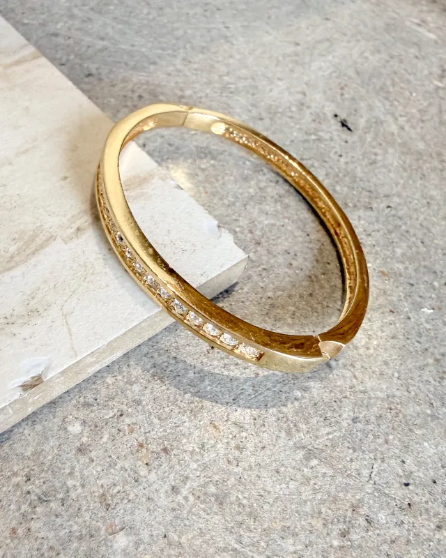 Vintage Crystal Gold Plate Oval Hinged Bangle Bracelet sold by Care Tucker